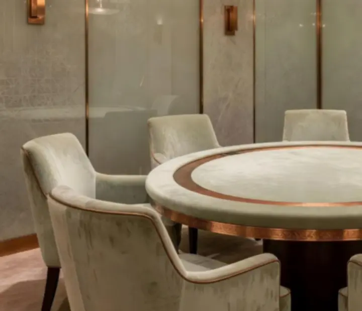 Private poker room with elegant seating, poker tables and warm Australian hospitality details