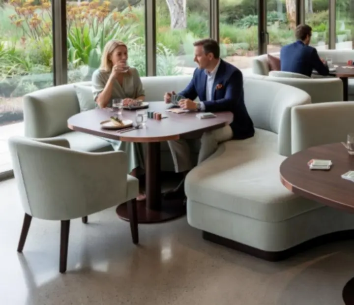Restaurant and lounge interior with poker tables, coastal tones and copper details